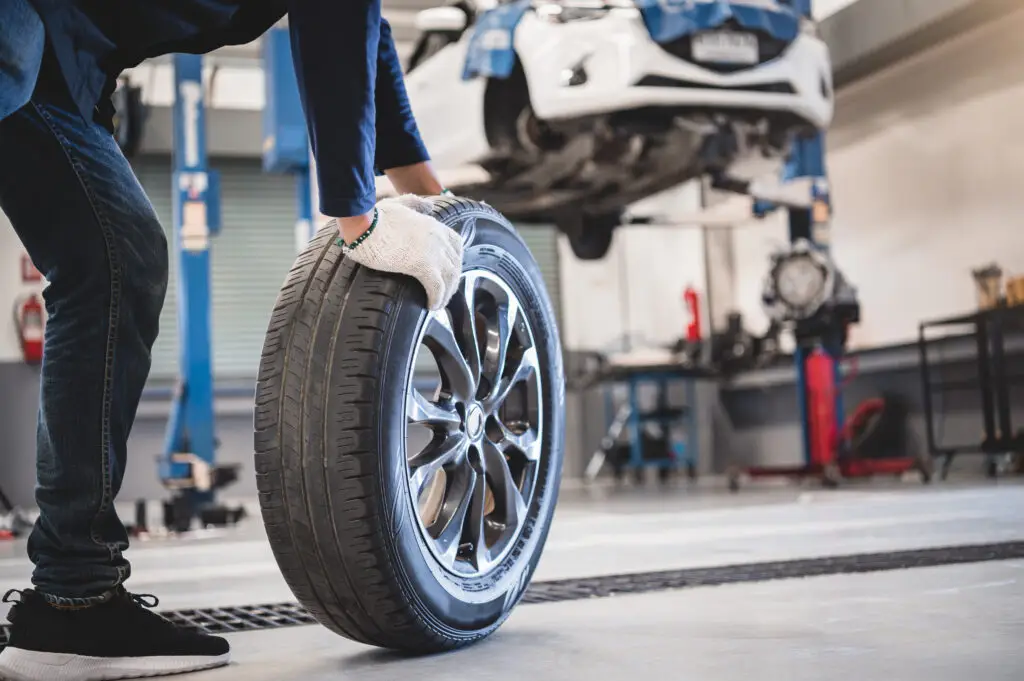 Mechanic changing tyres