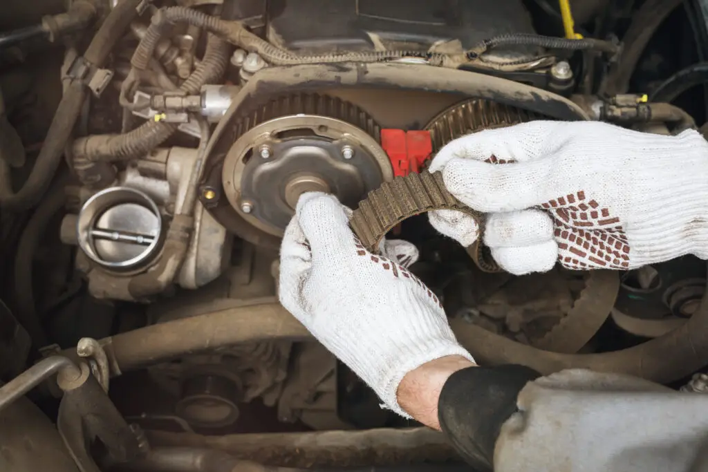 Mechanic changing timing belt